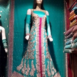 Ahsan Fabrics $ Lehnga House